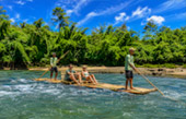 Bamboo Rafting Along Nature River