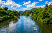 Bamboo Rafting Along Nature River